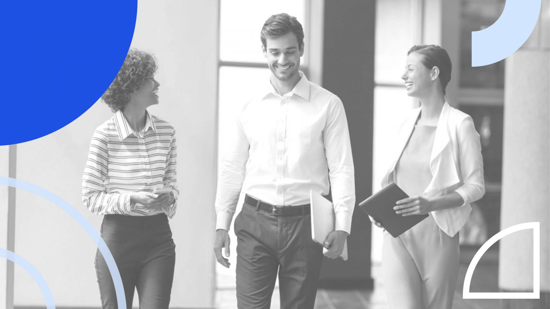 3 workers walking having a conversation